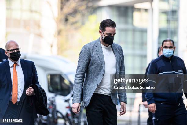 Former professional football player Christoph Metzelder arrives for the first day of his trial on charges of possessing and distributing child...