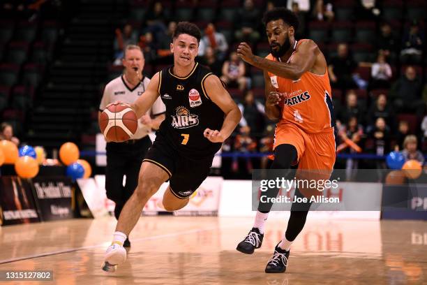 Francis Mulvihill of Taranaki runs the ball up court during the round one NBL match between the Southland Sharks and the Taranaki Mountainairs at ILT...