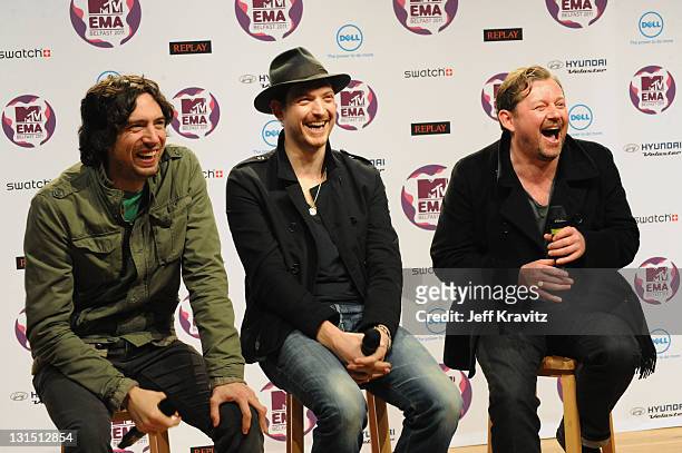 Snow Patrol with Gary Lightbody, Nathan Connolly and Tom Simpson attend a MTV Europe Music Awards 2011 press conference at Odyssey Arena on November...