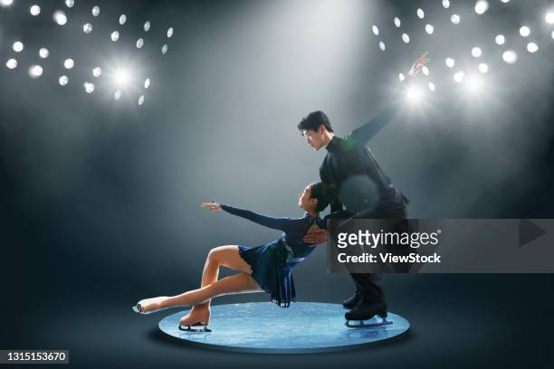 pairs figure skating - figure skating couple stock pictures, royalty-free photos & images