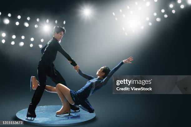 pairs figure skating - figure skating couple stock pictures, royalty-free photos & images