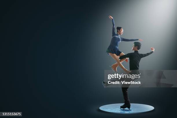 pairs figure skating - figure skating couple stock pictures, royalty-free photos & images