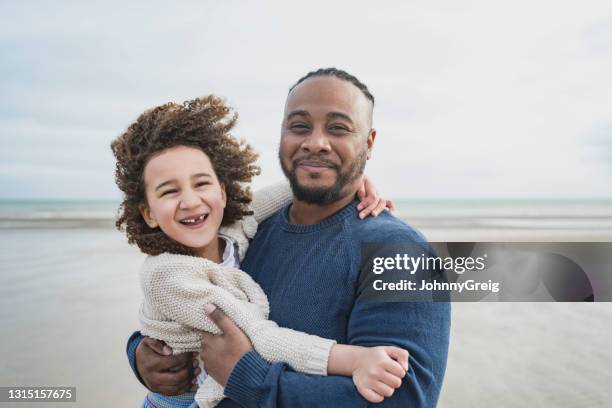 outdoor portrait of father and young daughter on vacation - family wellbeing stock pictures, royalty-free photos & images