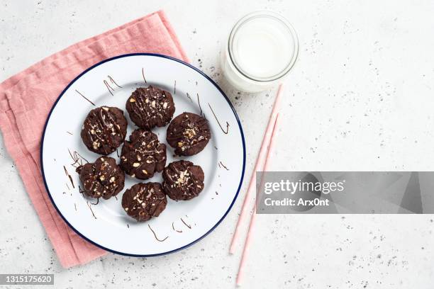 homemade chocolate cookies with chopped almonds - almond cookies stock pictures, royalty-free photos & images