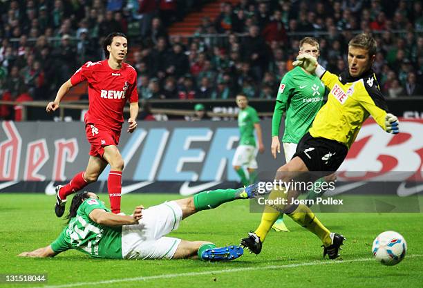 Claudio Pizarro of Bremen scores his team's first goal during the Bundesliga match between Werder Bremen and 1. FC Koeln at Weser Stadium on November...