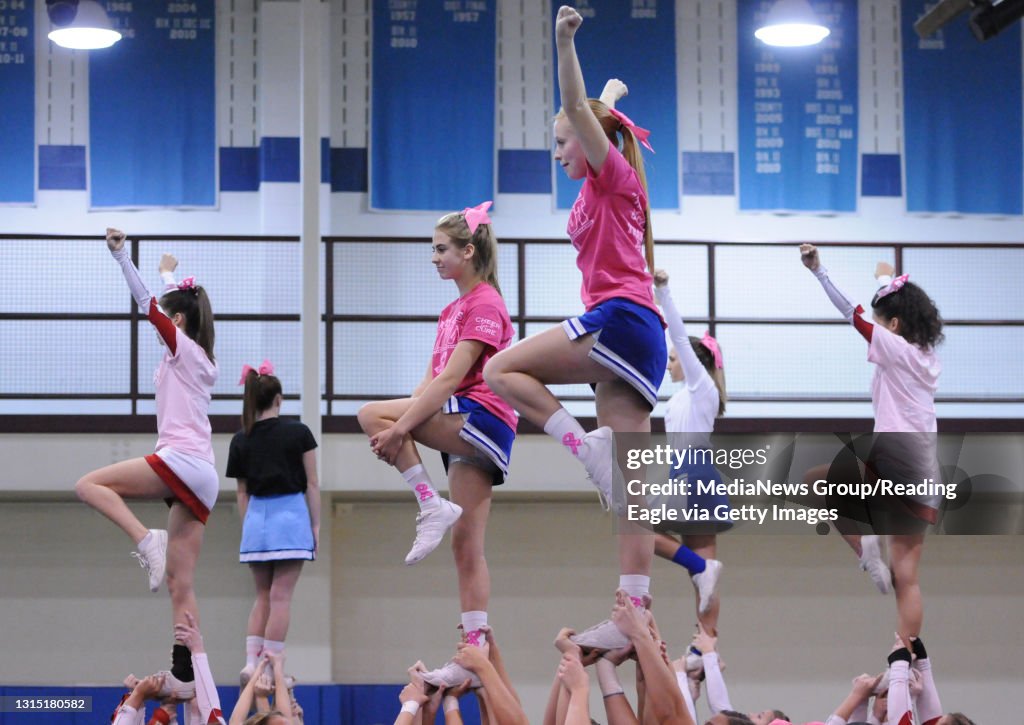 From left in the front center are Lexi Krufka, 16, and Jane Stewart, 16, both members of the Exeter Varsity cheerleading team. They were competing against other teams to see who could stay up in the air the longest.  At Daniel Boone High School Sa