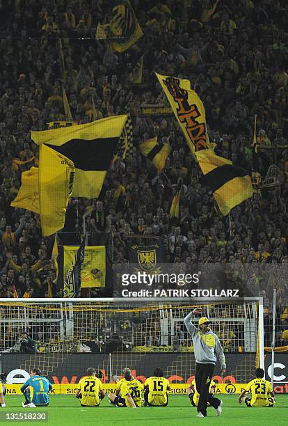 Dortmund's head coach Juergen Klopp celebrates after the German first division Bundesliga football match Borussia Dortmund vs VfL Wolfsburg in the...