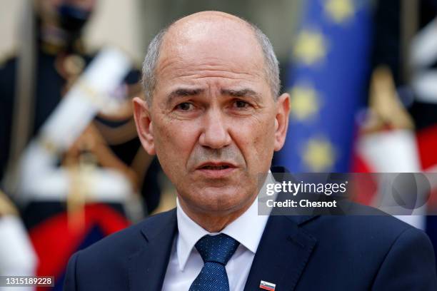 Slovenia's Prime Minister Janez Jansa poses for photographers prior to a working lunch with French President Emmanuel Macron at the Elysee...