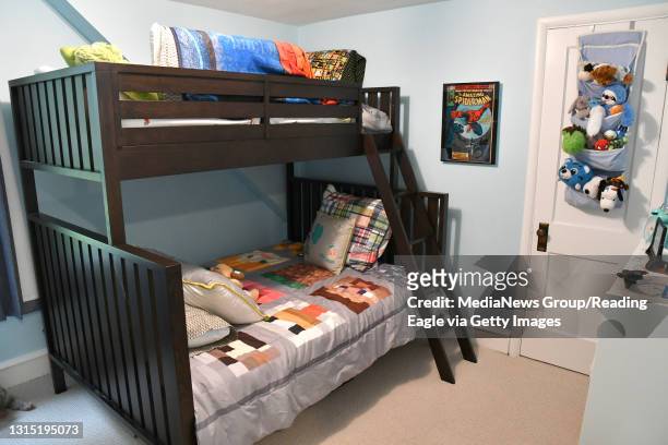 Bunk-bed is featured in the bedroom of the McAnulty's 10 year-old son, Christian. Floor Plans: Shawn and Heather McAnulty hired Breyer Construction...