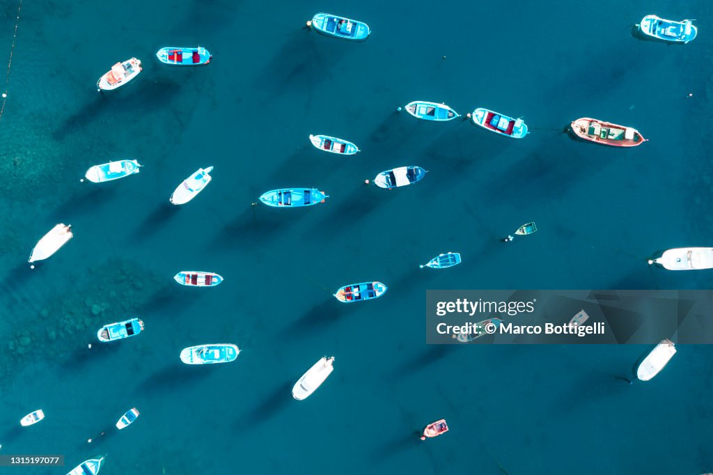 Overhead view of moored boats in a harbor
