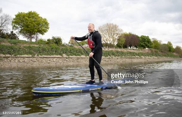 James Haskell takes part in a training session ahead of the stand up paddle board challenge, to paddle the length of the Basingstoke Canal in support...
