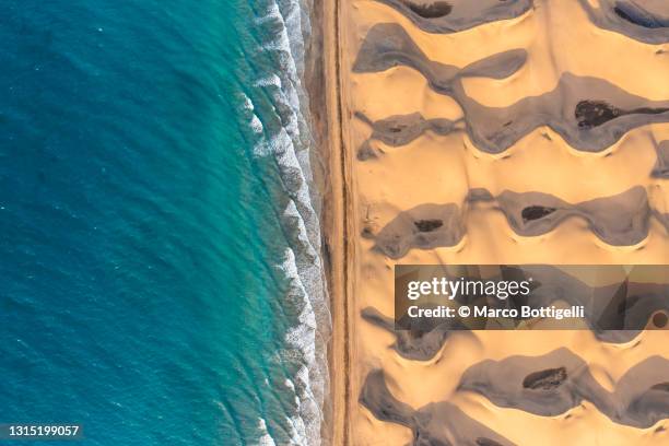 aerial view of sand dunes along the coastline, grand canary island, spain - playa canarias stock pictures, royalty-free photos & images