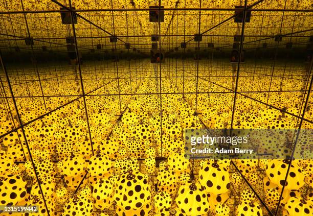 The installation "The Spirits of the Pumpkins Descended Into the Heavens" by Yayoi Kusama is seen at the "Yayoi Kusama: A Retrospective - A Bouquet...