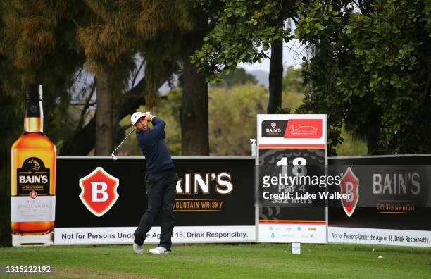 Romain Wattel of France plays his tee shot on the 18th hole during Day One of the Bain's Whisky Cape Town Open at Royal Cape Golf Club on April 29,...