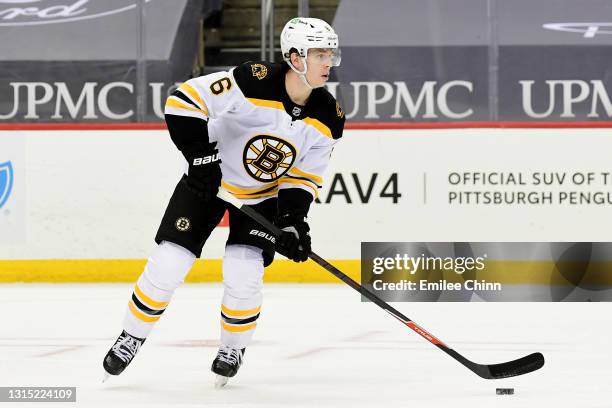 Mike Reilly of the Boston Bruins handles the puck during a game between the Pittsburgh Penguins and Boston Bruins at PPG PAINTS Arena on April 27,...