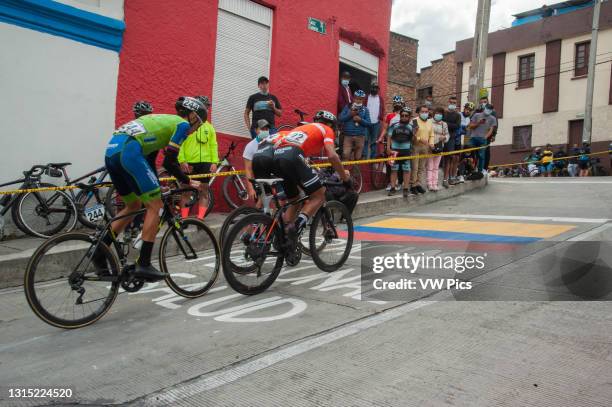 Ciclysts participate in the last stage of the ciclyng tour Vuelta a Colombia 2021 in streets of Bogota, where people support participants during the...