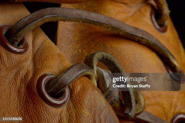 vintage baseball glove details - leather laces foto e immagini stock