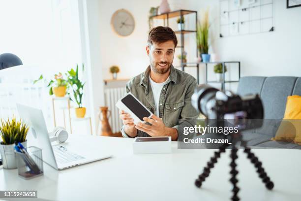 vlogger unboxing phone - digital camera tripod isolated stock pictures, royalty-free photos & images