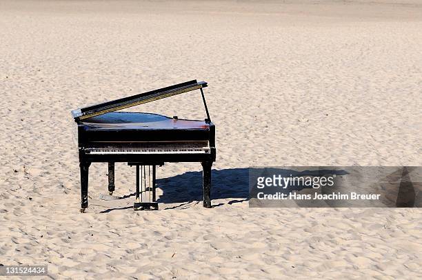 piano on beach - beach music stock pictures, royalty-free photos & images