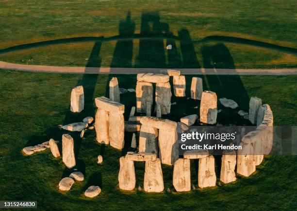 an aerial view of stonehenge at sunrise - stock photo - stonehenge stock pictures, royalty-free photos & images