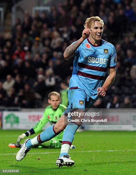 Jack Collison of West Ham United celebrates scoring his side's second goal during the npower Championship match between Hull City and West Ham United...