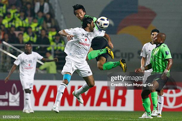 Mohammed Kasola of Al Sadd heads the ball during the AFC Champions League Final Match between Jeonbuk Hyundai Motors of South Korea and Al Sadd of...