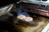 Making burgers from cutlets and shelves at McDonald's