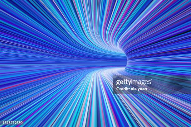multicolored light trails in illuminated tunnel - futuristic tunnel stock pictures, royalty-free photos & images