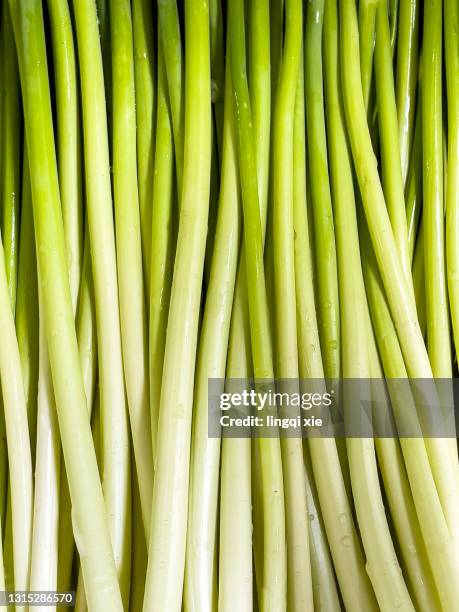 Premium Photo  A sack of garlics shallots and onions