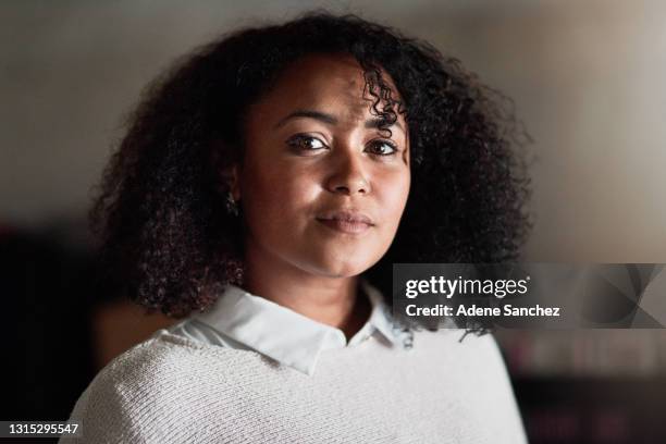 shot of a young woman at home - 30 year old woman stock pictures, royalty-free photos & images