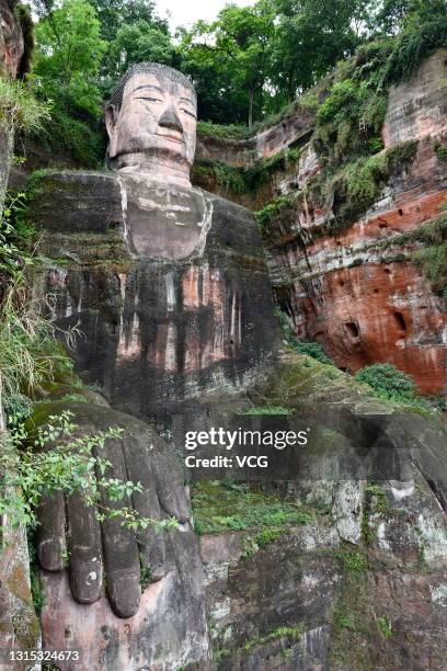 Tourists visit Leshan Giant Buddha as the May Day holiday draws near on April 28, 2021 in Leshan, Sichuan Province of China.