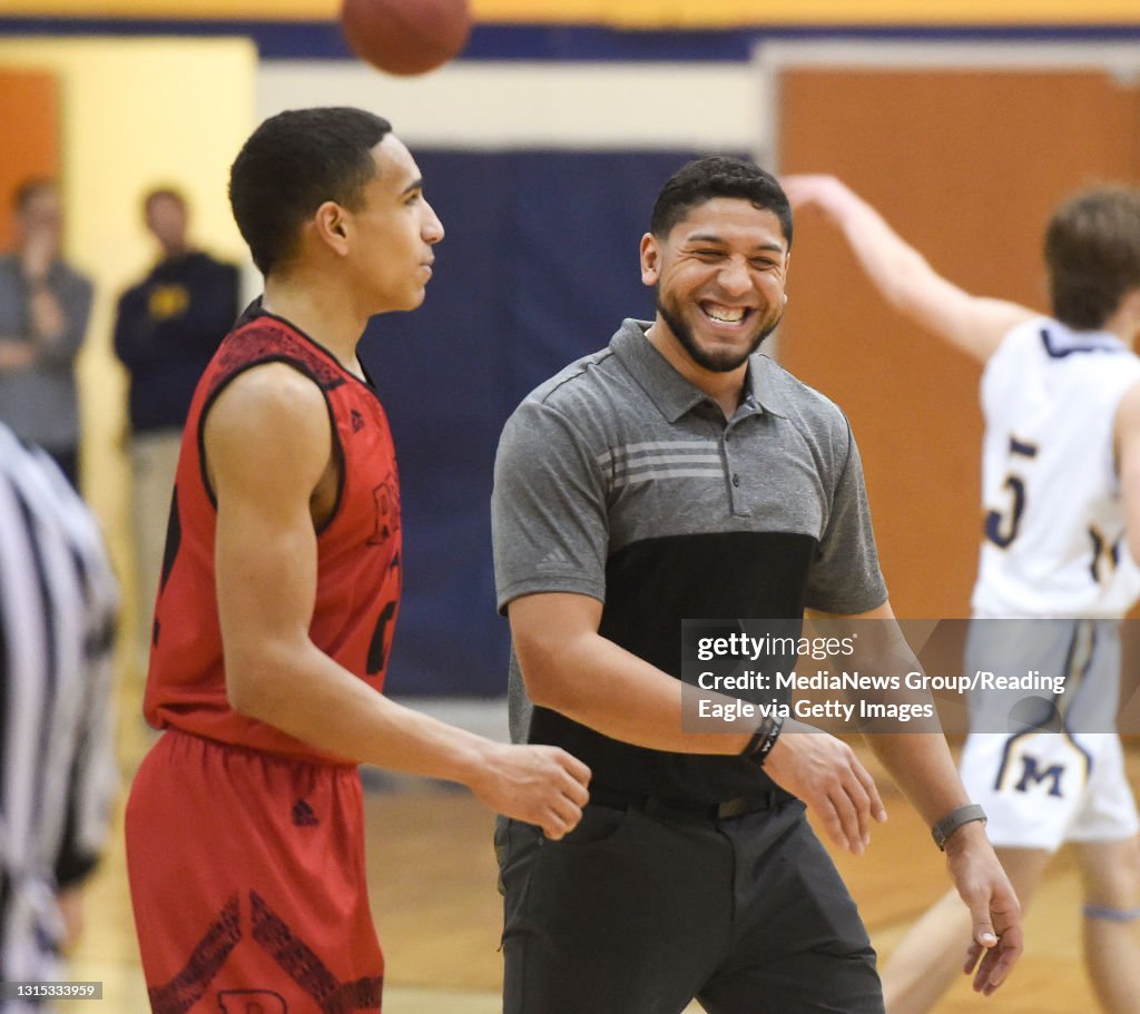 Reading High Boys basketball head coach Rick Perez with Juan Mato