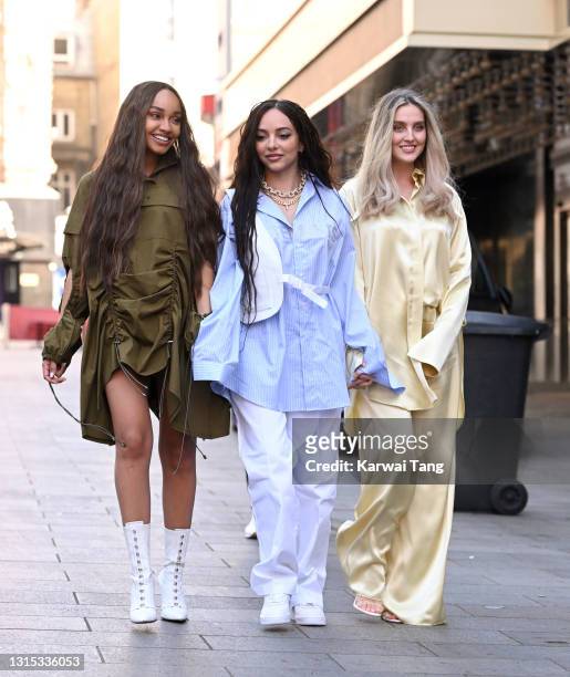 Leigh-Anne Pinnock, Jade Thirlwall and Perrie Edwards of Little Mix arrive at Global radio studios on April 30, 2021 in London, England.