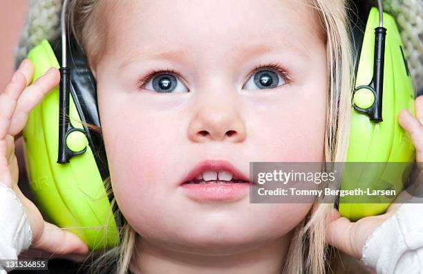 hearing protection - ear protection stock pictures, royalty-free photos & images