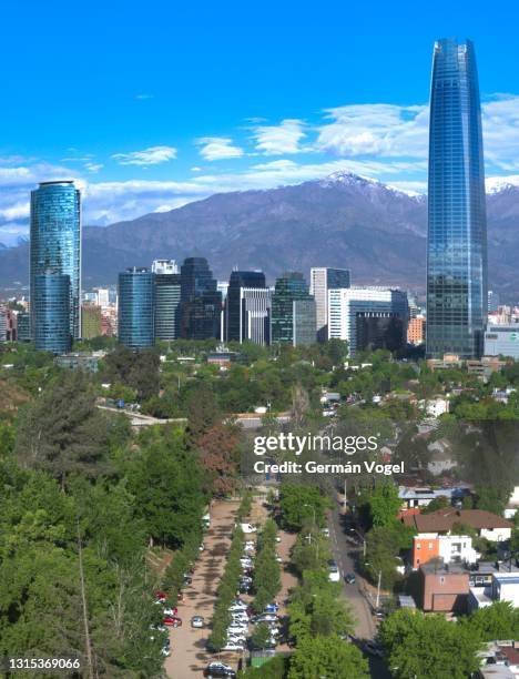 santiago de chile landmark city skyline by andes mountains with clean air - chile skyline stock pictures, royalty-free photos & images