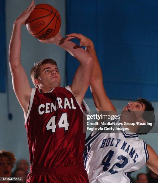 Reading, PA 200500035- Central Catholic's Adam Schleicher , #44, and Byron Eways , #42, vie for the ball.Central Catholic Holy Name Boys Basketball...