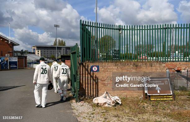 Nottinghamshire fielders head out from the changing rooms via the club car park ahead of the LV= Insurance County Championship match between at...