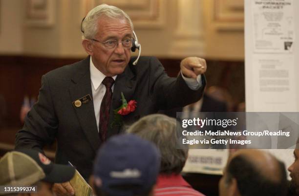 Photo Ryan McFadden 200502209 City property auction in city council chambers; Wil - Hahn of Bath, Pa and Auctioneer for Max Spann Auctions. He is...