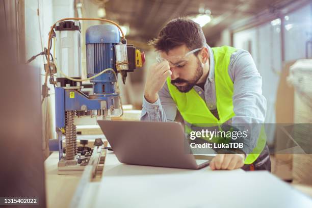 exhausting jobs - frustrated workman stock pictures, royalty-free photos & images