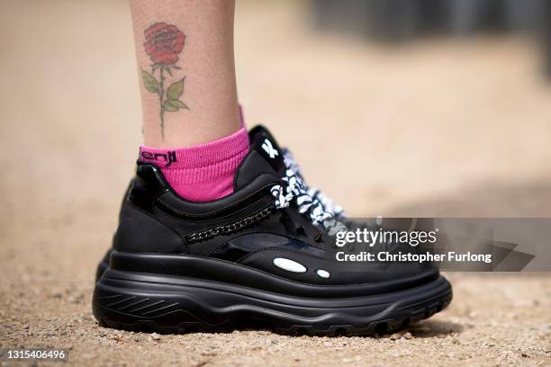 Red rose tattoo, the symbol of the British Labour Party, adorns the ankle of Deputy leader of the Labour Party Angela Rayner as she talks to Covid-19...