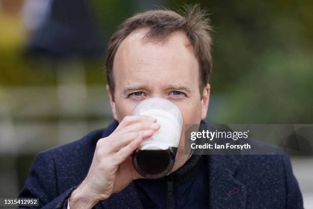 Matt Hancock MP, Secretary of State for Health, drinks a pint as he visits the Rudds Arms pub for a photocall after campaigning in Middlesbrough on...