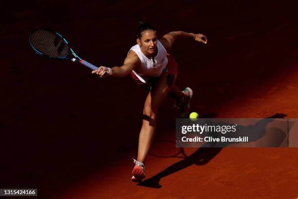 Karolina Pliskova of Czech Republic stretches for a forehand in her first round match against Cori Gauff of USA during day two of the Mutua Madrid...