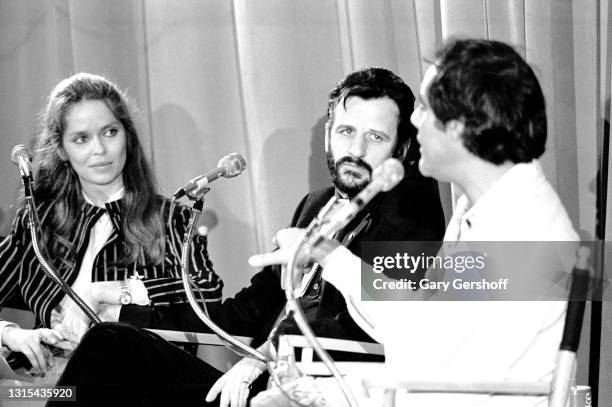 View of, from left, American actress Barbara Bach, British musician Ringo Starr, and comedian Robert Klein, during the recording of an episode of the...