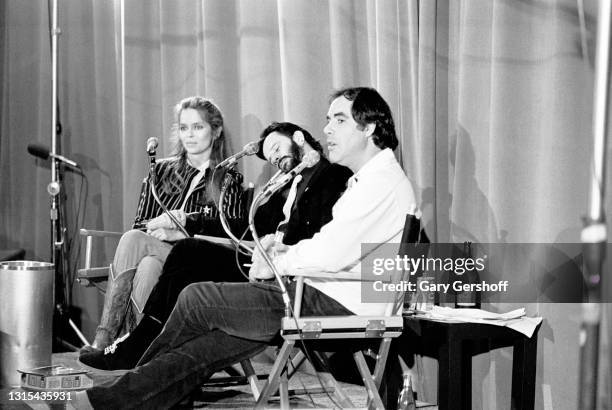 View of, from left, American actress Barbara Bach, British musician Ringo Starr, and comedian Robert Klein, during the recording of an episode of the...