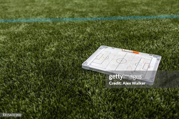 soccer tactics board on astroturf grass - felt tip pen bildbanksfoton och bilder
