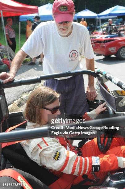 Photo by Lauren A. LittleAugust 23, 2009Duryea Hill ClimbJoanna L. Shields turns on her father, Bill M. Shields', MGB before driving to the starting...