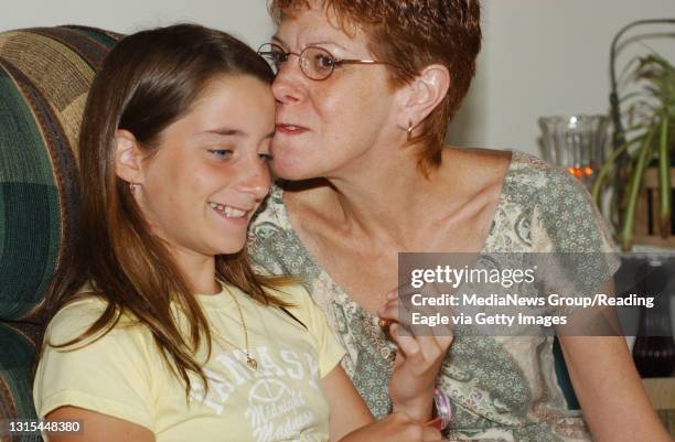 Lauren A. LittleJune 18, 2004Robin Hammacker spends some time with her youngest daughter Natalie, 11.