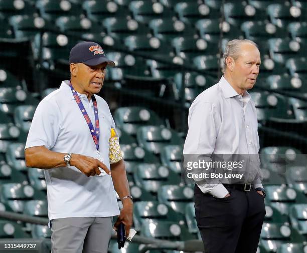 Houston Astros owner Jim Crane, right, and hall of famer Reggie Jackson during batting practice as the Houston Astros play the Seattle Mariners at...