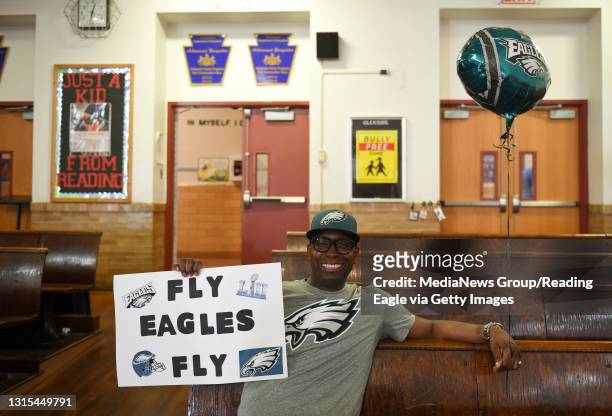 Reading School District Superintendent Dr. Khalid Mumin poses in his Eagles gear after shooting a video with students at Glenside Elementary. Photo...