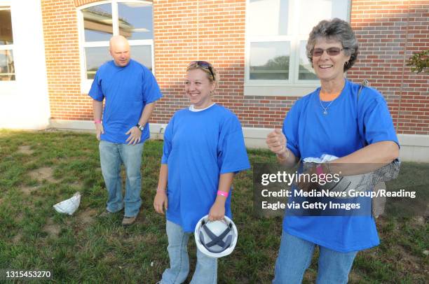 Photo Ryan McFadden Extreme Makeover. This is at Tilden Elem early in the morning; from left are volunteers Tim Reed of Latrobe, Pa. He was Trisha's...
